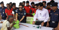 কুড়িগ্রামে বন্যার্তদের মাঝে পুলিশের ত্রাণ বিতরণ