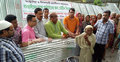 প্রবাসীদের অনুদানে নীলফামারী বানভাসিদের ঢেউটিন বিতরণ