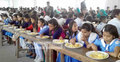 নওগাঁয় সীমান্ত পাবলিক স্কুলে মিড ডে মিল চালু