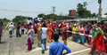 নারী শ্রমিককে মারধর করায় সড়ক অবরোধ