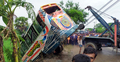 রাস্তা ছেড়ে খালে বেপরোয়া গতির বাস