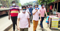 করোনা প্রতিরোধে রাস্তায় নামলেন বাবা-ছেলে