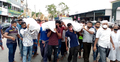৩ জনের লাশ কাঁধে নিয়ে ঝাড়ু মিছিল