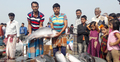 মেলায় জামাই-শ্বশুরের মাছ কেনার প্রতিযোগিতা