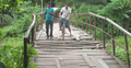 ৪৯ বছরের কাঠের সেতুটি এখন মরণ ফাঁদ