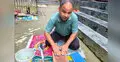 কাগজ দিয়ে পরিবেশবান্ধব কলম তৈরি করছেন দৃষ্টি প্রতিবন্ধী শরিফুল
