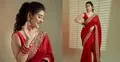 সোনালি পাড়ের লাল শাড়িতে ঝলমলে ইন্দ্রানী