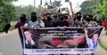 মুখে কালো কাপড় বেঁধে আওয়ামী লীগের মিছিল