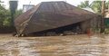 বন্যার পানিতে একে একে ভেঙে পড়ছে মাটির ঘর