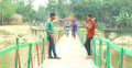 গ্রামবাসীর ৭ লাখ টাকায় নদীর ওপর দৃষ্টিনন্দন কাঠের সেতু
