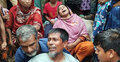 নওগাঁয় একই পরিবারের চারজনকে গলা কেটে হত্যা