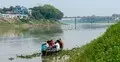 সেতু থাকতেও নৌকায় নদী পাড় হয় এখানকার মানুষ