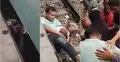 ছেলেকে বাঁচাতে ট্রেনের নিচে ঝাঁপ, বাংলাদেশের ভিডিওতে বিশ্বজুড়ে তোলপাড়