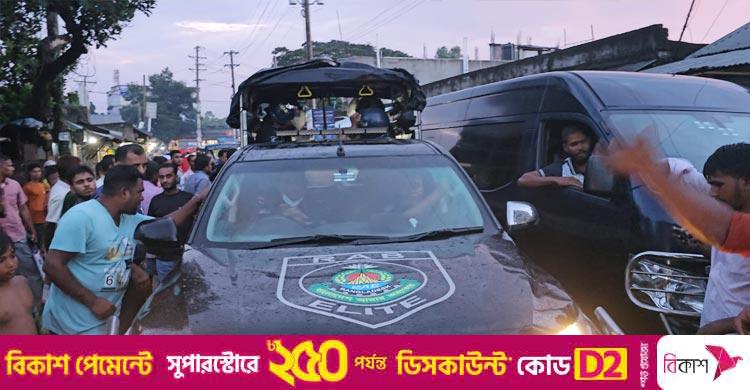 গাজীপুর / ব্যবসায়ীকে আটকের প্রতিবাদে র‌্যাবের গাড়ি আটকিয়ে বিক্ষোভ