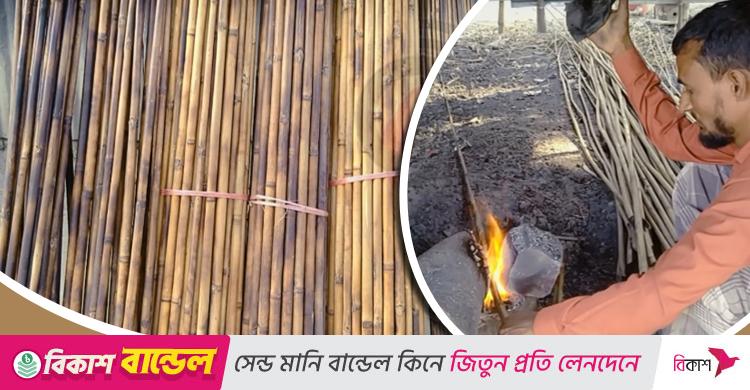 গ্রামজুড়ে চলছে চুলার আগুনে বাঁশ সেঁকা